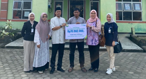 BPJS Ketenagakerjaan Serahkan Santunan JKK Rp70 Juta di SMKN 1 Muaro Jambi